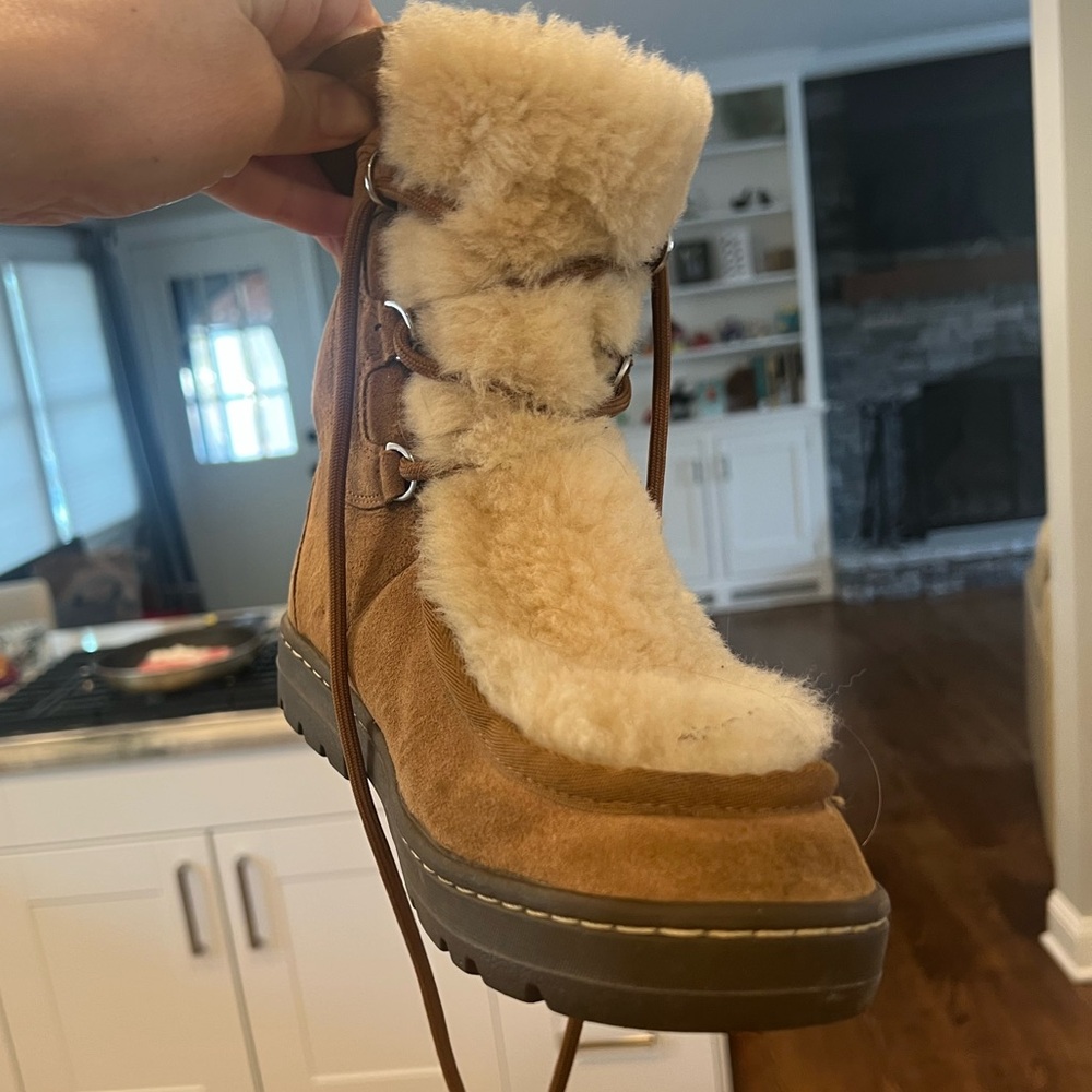 Cute fuzzy Ugg boots. Worn but in good condition. Has a more sturdy sole.